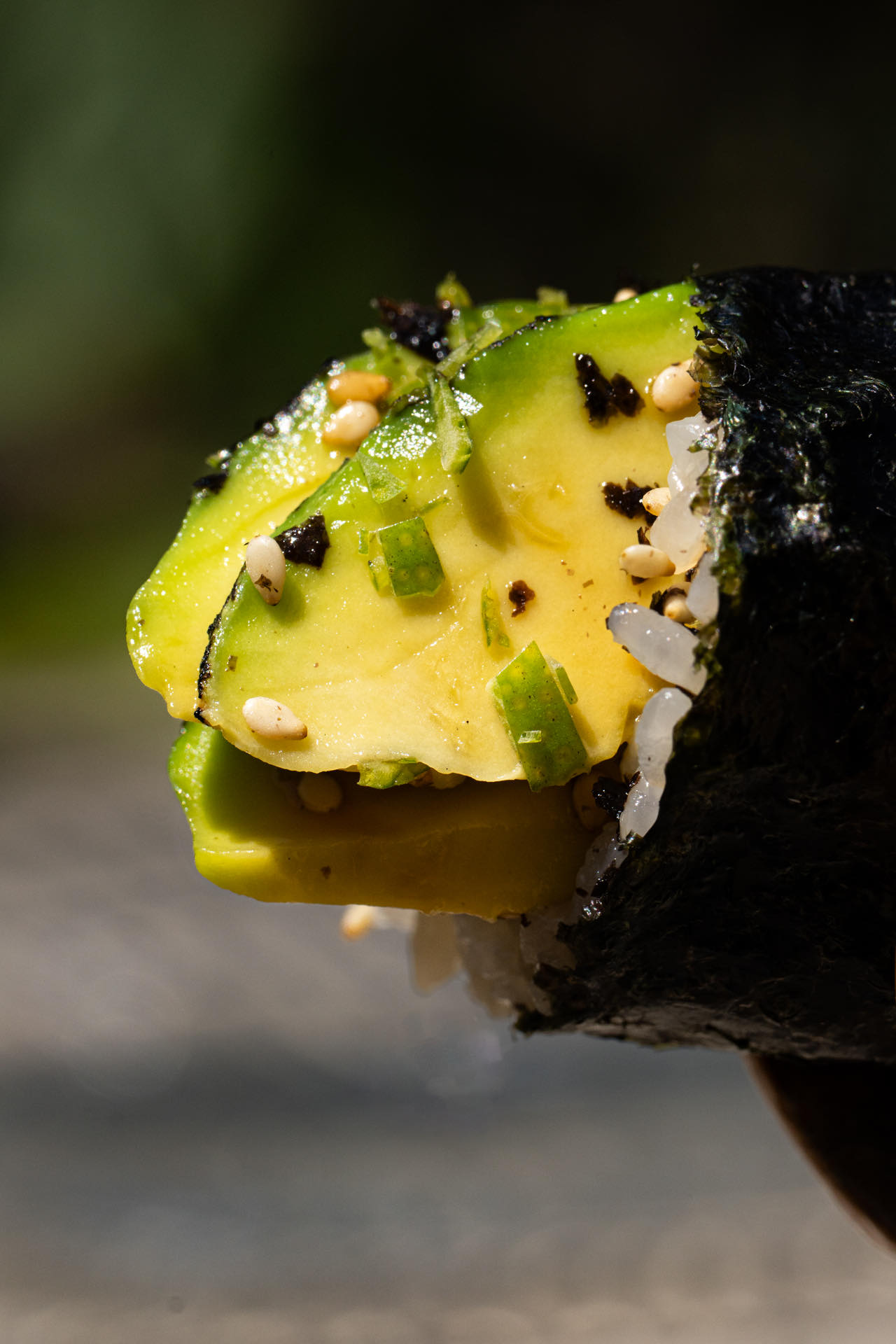 Charred avocado hand roll with furikake and sesame
